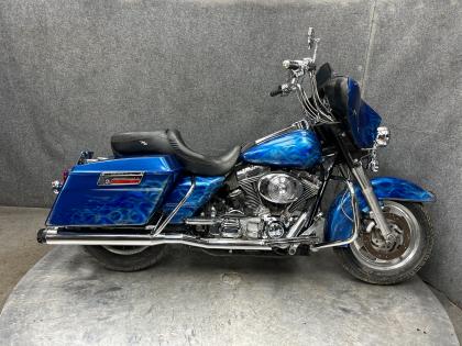 Thumbnail of salvage repairable 2006 Harley-Davidson FLHTI for sale.